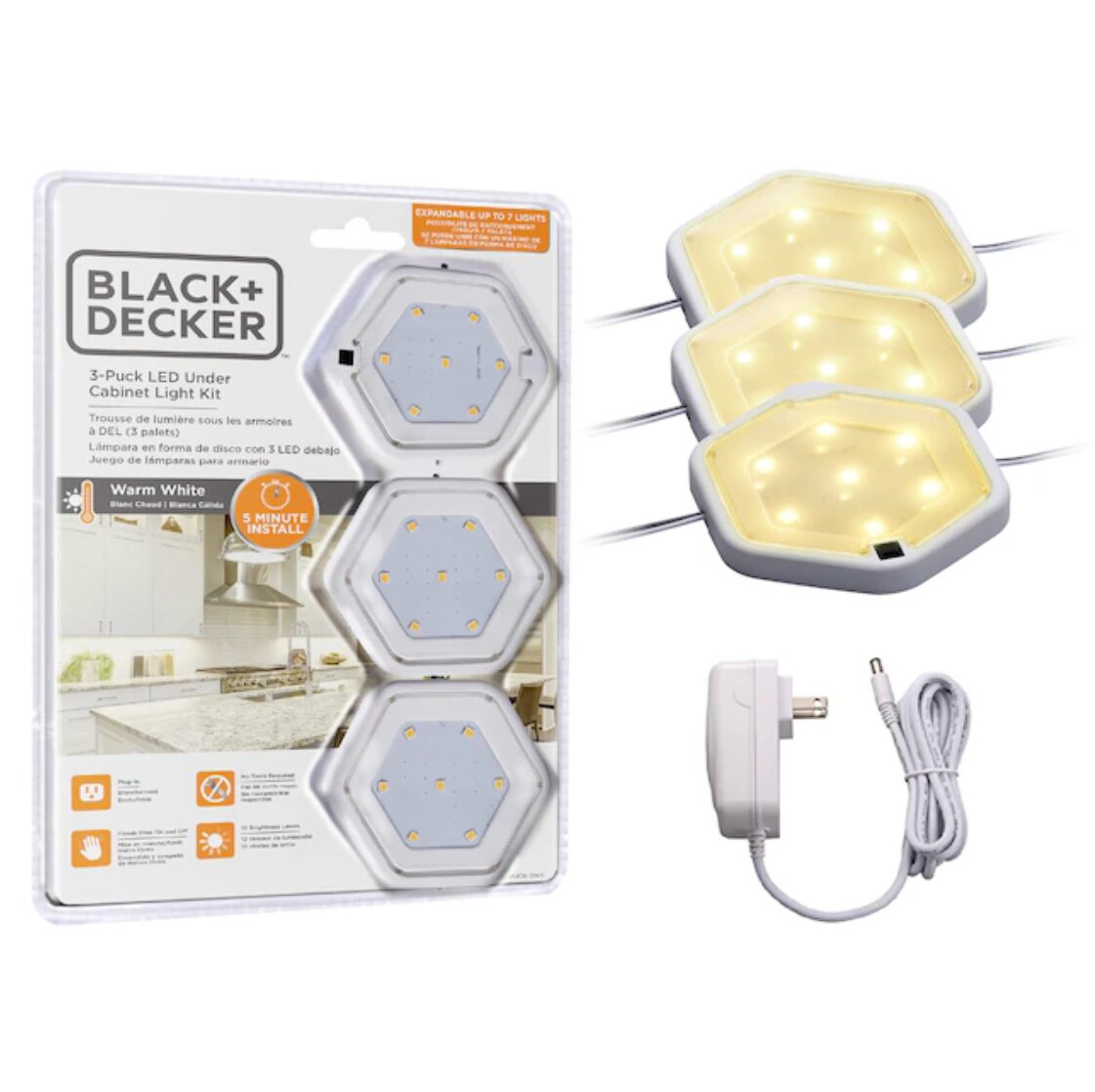 Retail packaging image of a three-pack of hexagonal under-cabinet lights with a power adapter and lit warm-white pucks beside it.